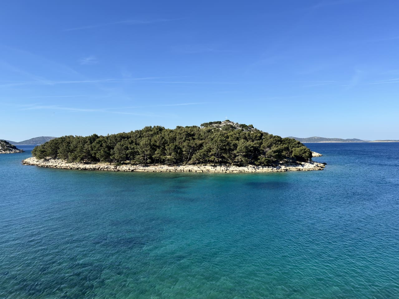 Blue Adriatic water and a small island near Tribunj